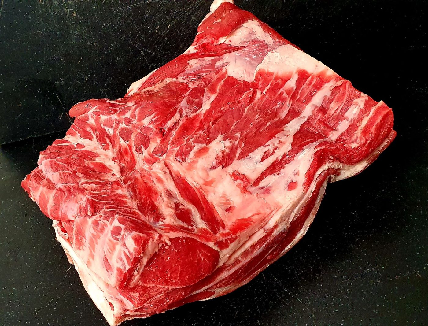 A marbled joint from Kirkby Malzeard cattle, hung and cut on the block.